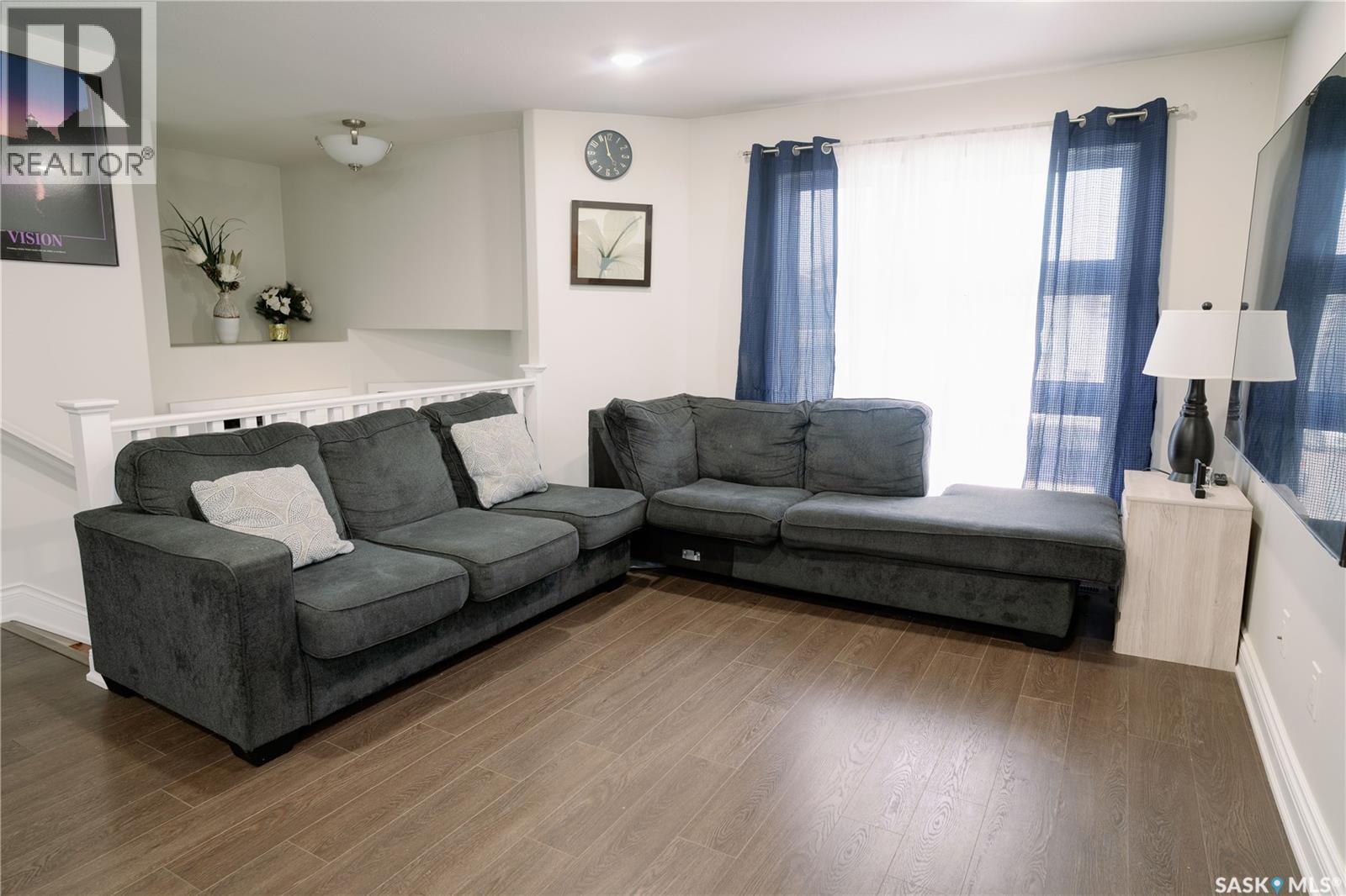205 Reddekopp Lane, Warman, SK - Indoor Photo Showing Living Room