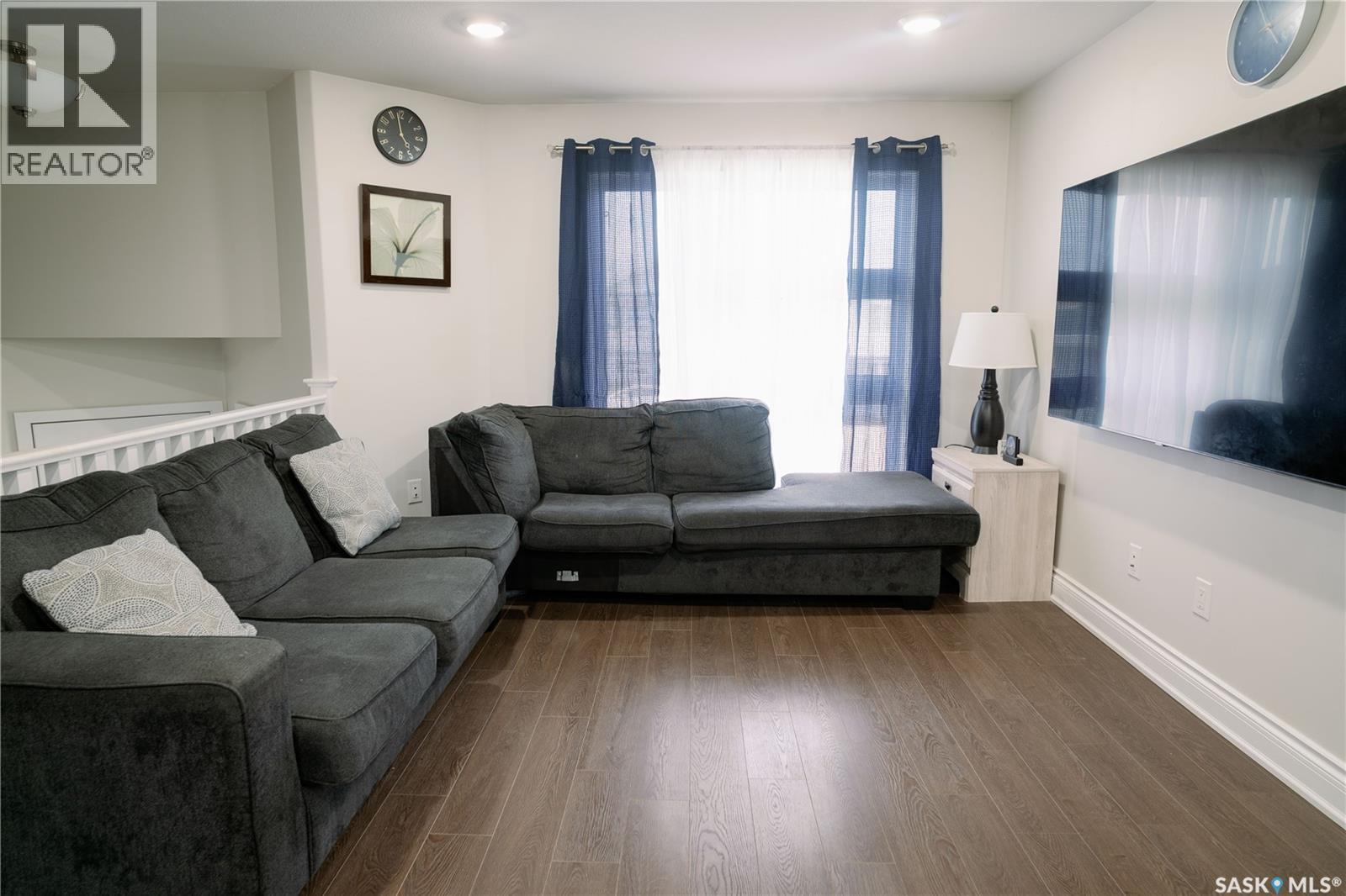 205 Reddekopp Lane, Warman, SK - Indoor Photo Showing Living Room