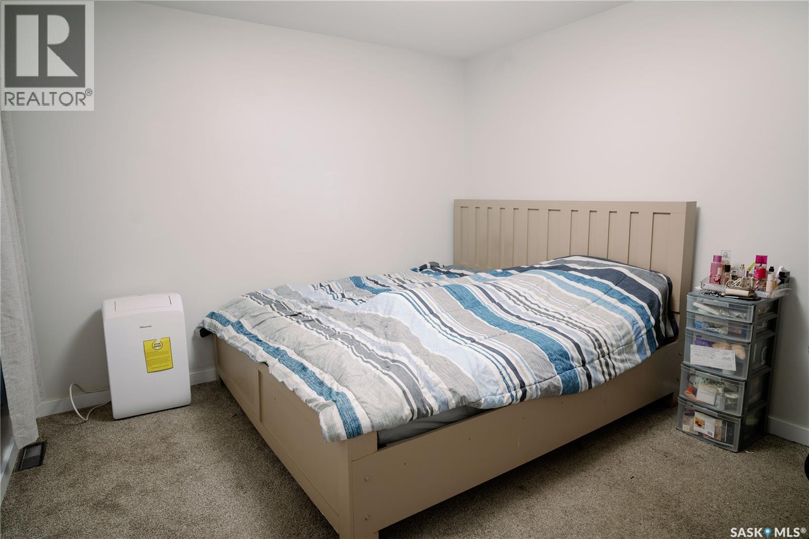 205 Reddekopp Lane, Warman, SK - Indoor Photo Showing Bedroom