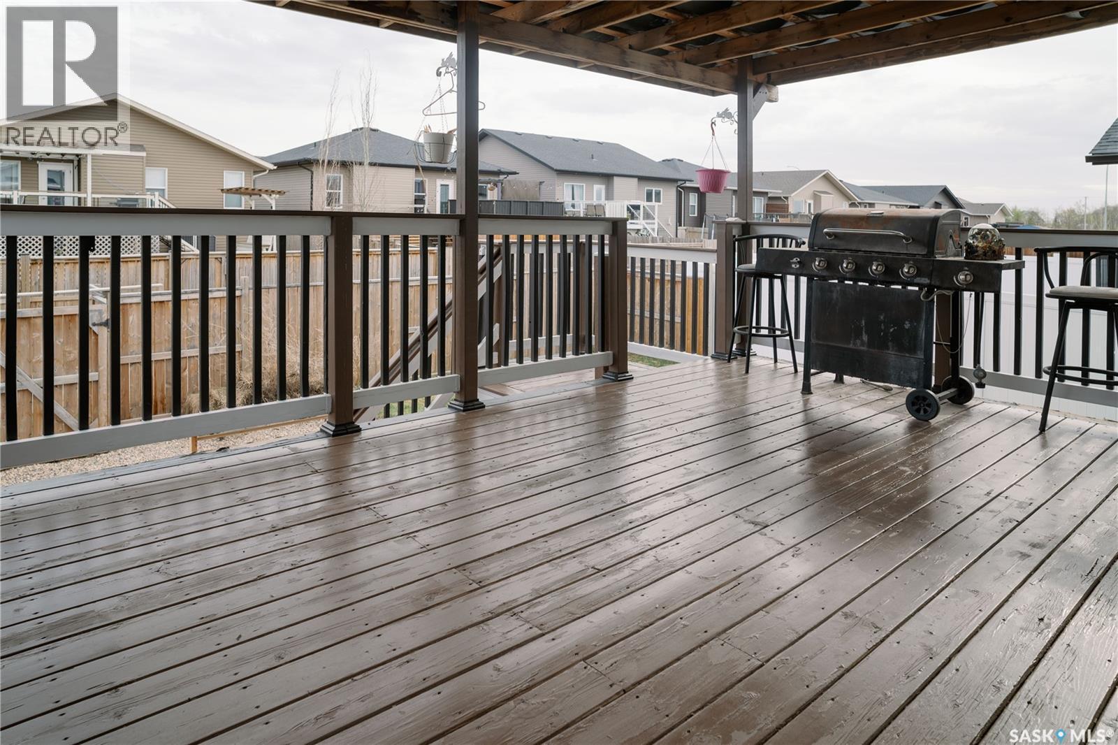 205 Reddekopp Lane, Warman, SK - Outdoor With Deck Patio Veranda With Exterior