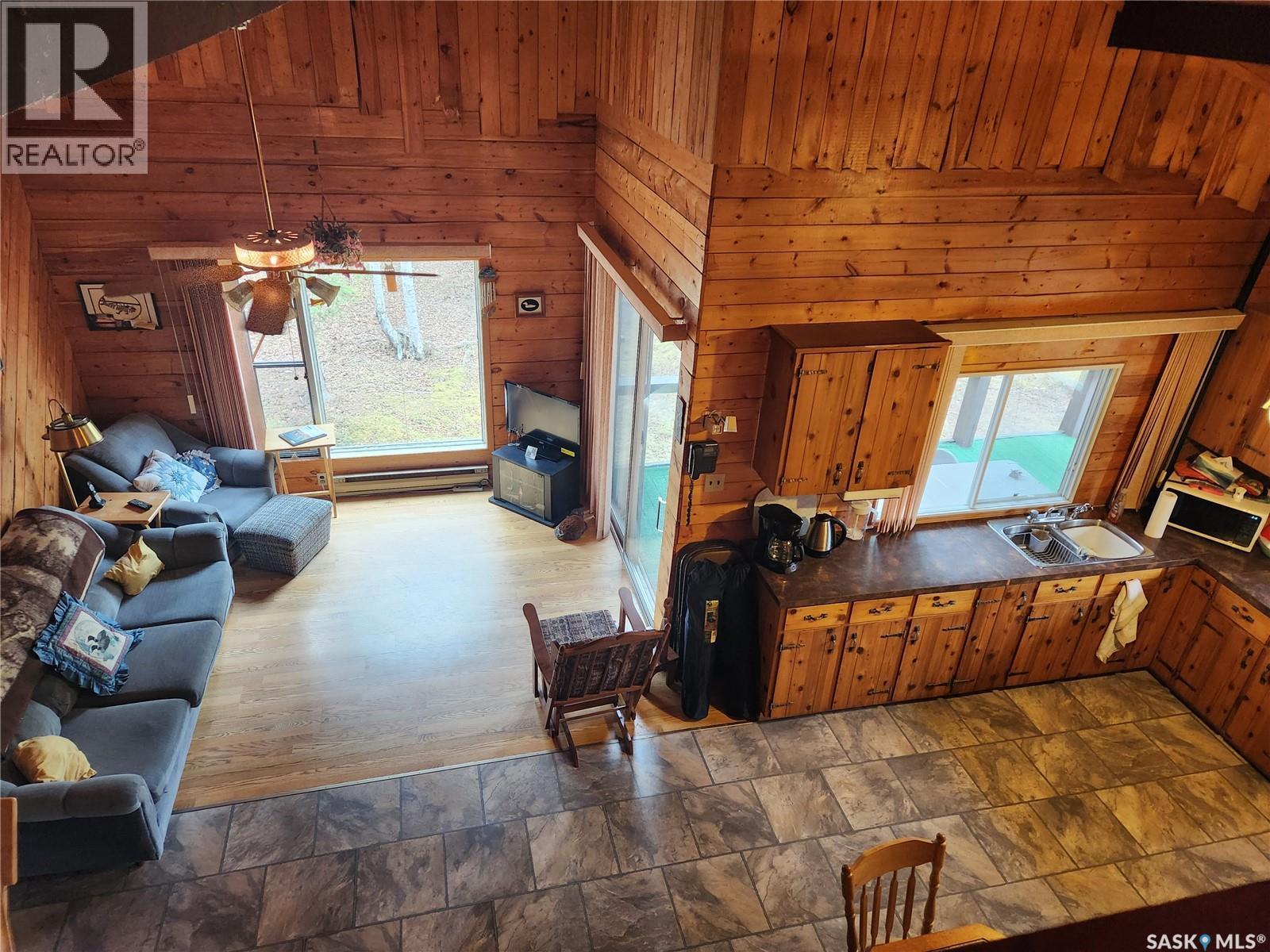 #5 Lookout Road, Northern Admin District, SK - Indoor Photo Showing Living Room With Fireplace