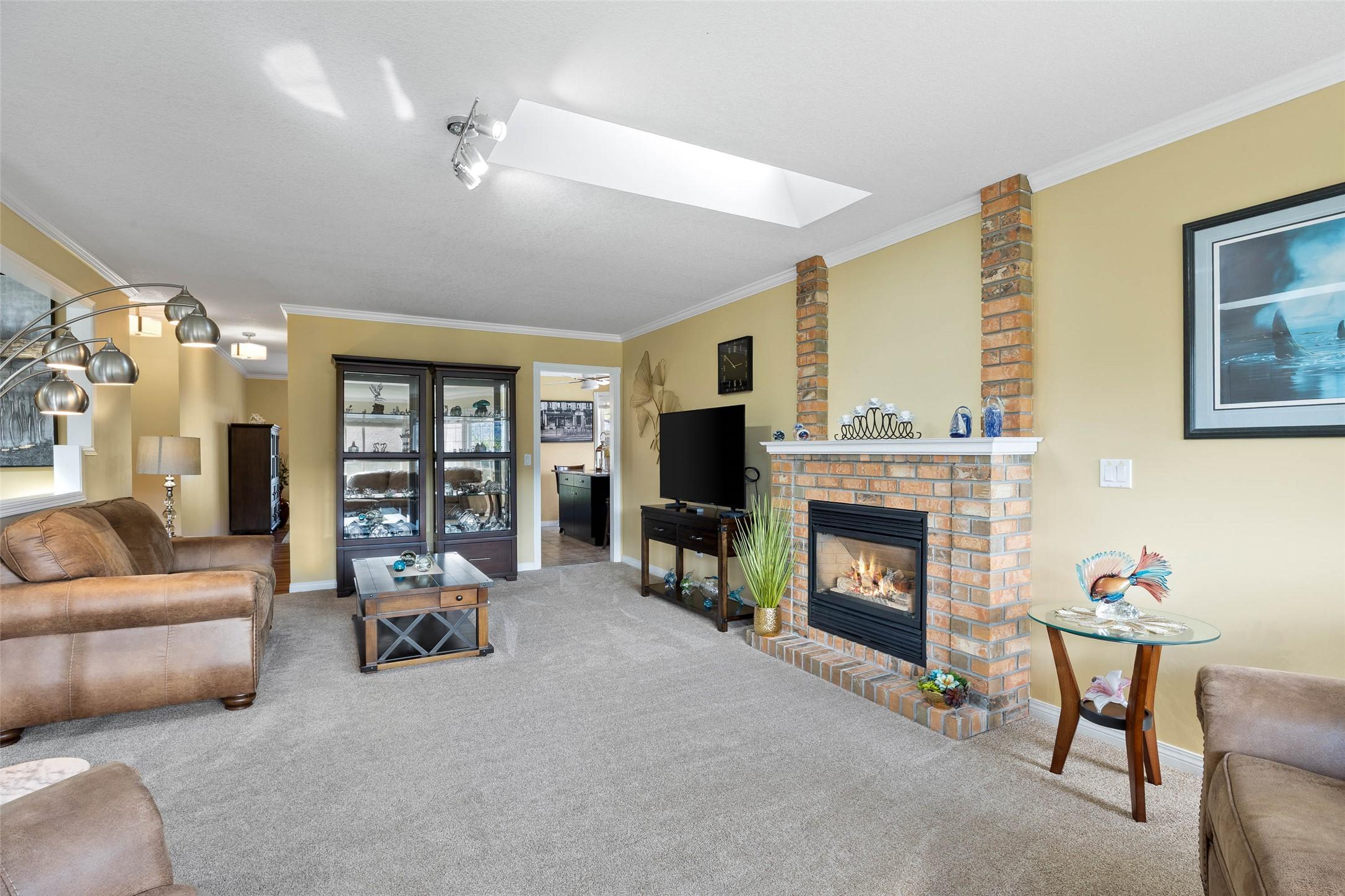 3577 Navatanee Drive, Kamloops, BC - Indoor Photo Showing Living Room With Fireplace