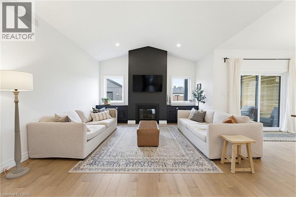 24 Gilmer Crescent, Listowel, ON - Indoor Photo Showing Living Room With Fireplace