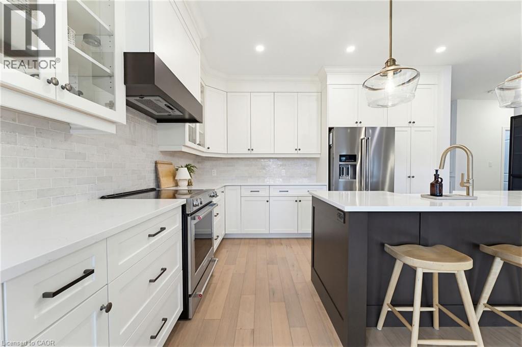 24 Gilmer Crescent, Listowel, ON - Indoor Photo Showing Kitchen With Upgraded Kitchen