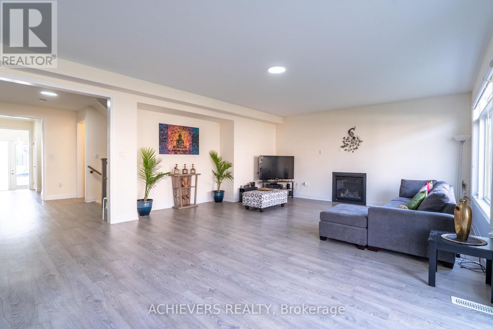 47 Daffodil Road, Springwater, ON - Indoor Photo Showing Living Room With Fireplace