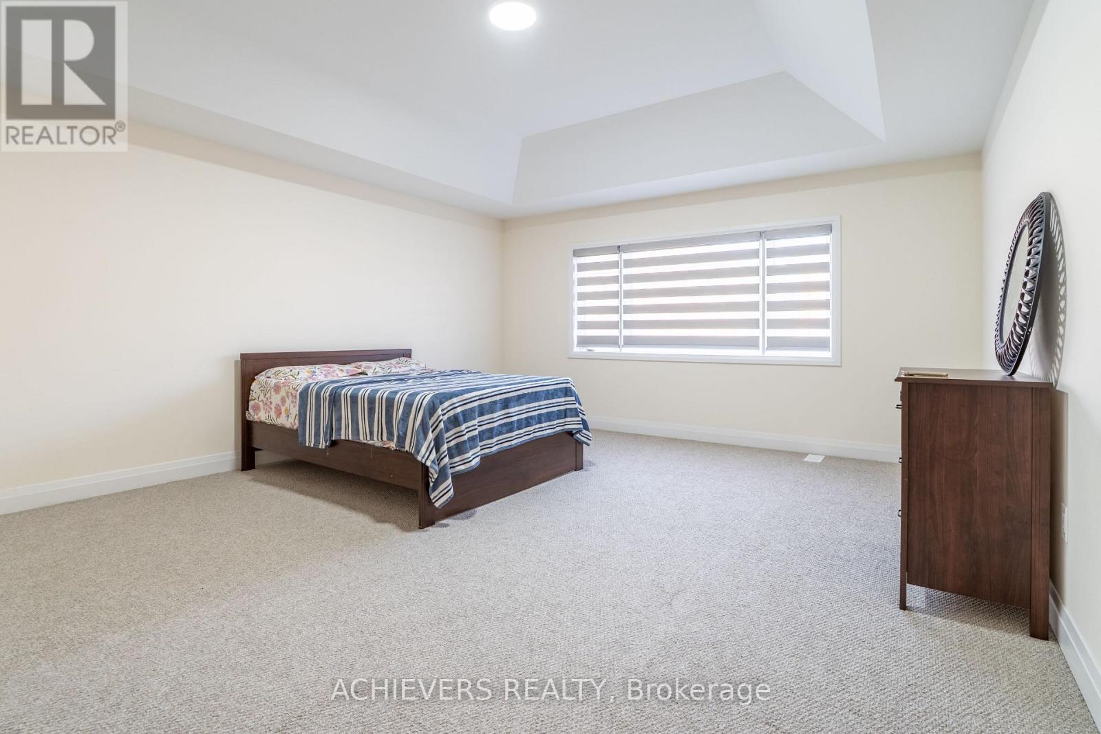 47 Daffodil Road, Springwater, ON - Indoor Photo Showing Bedroom