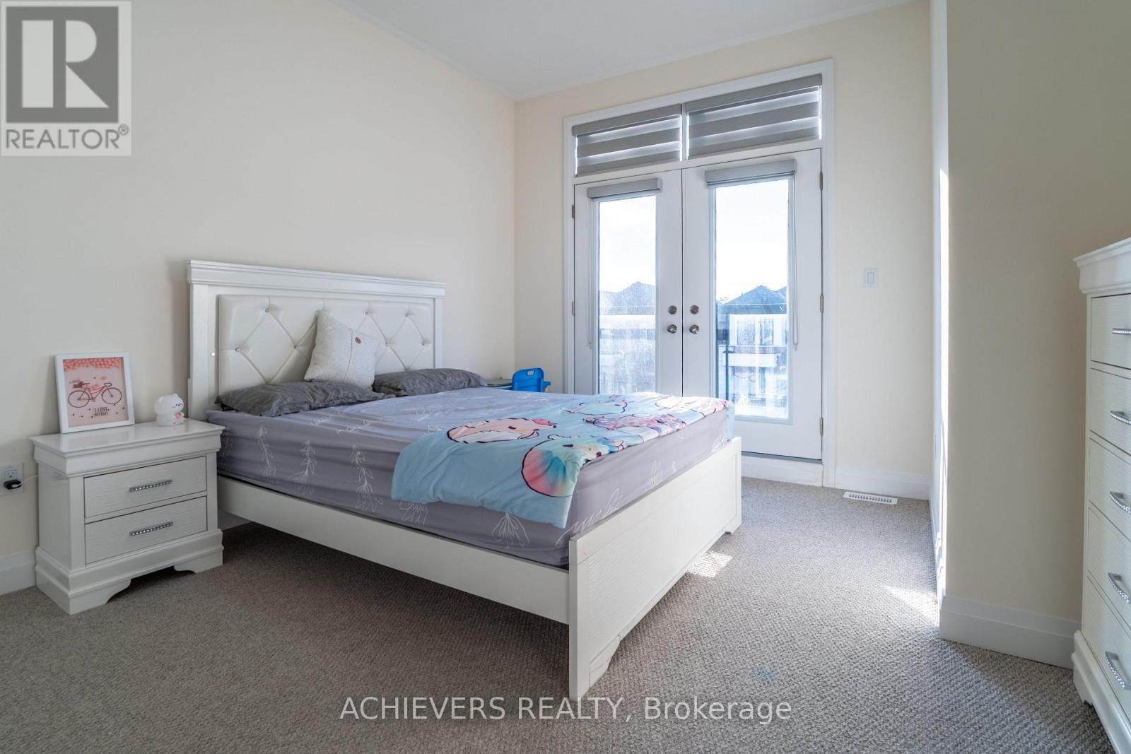 47 Daffodil Road, Springwater, ON - Indoor Photo Showing Bedroom