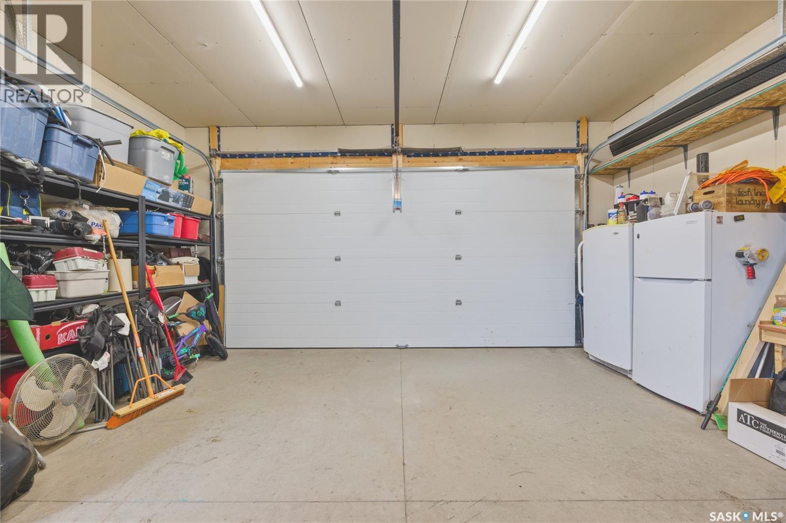 386 Levalley Cove, Saskatoon, SK - Indoor Photo Showing Garage