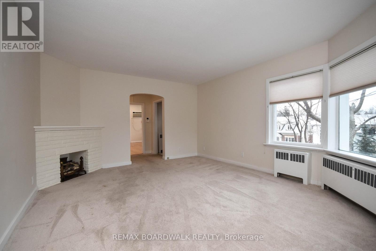 11 Kippewa Drive, Ottawa, ON - Indoor With Fireplace