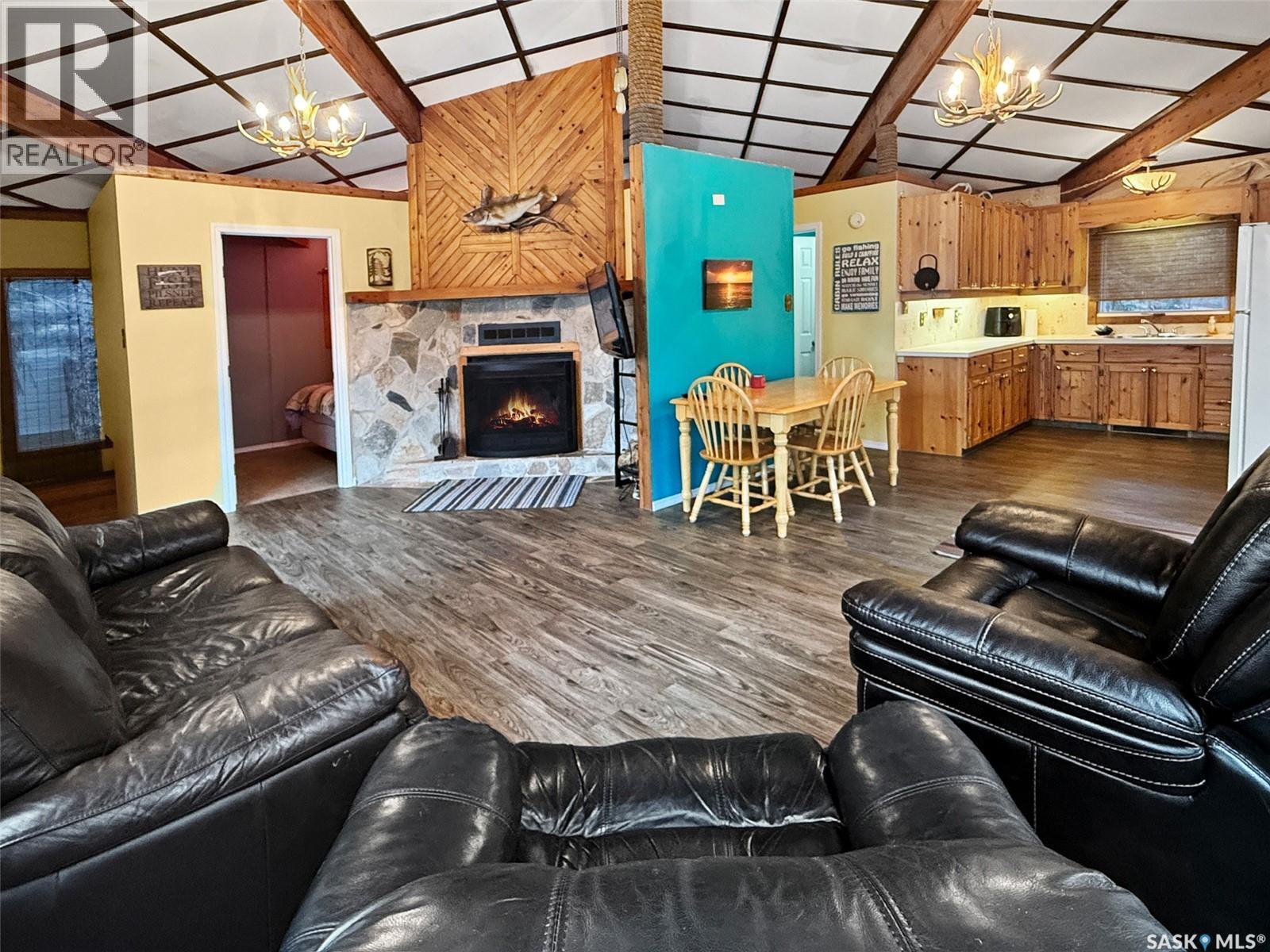 105 Otter Crescent, Beaver Flat, SK - Indoor Photo Showing Living Room With Fireplace