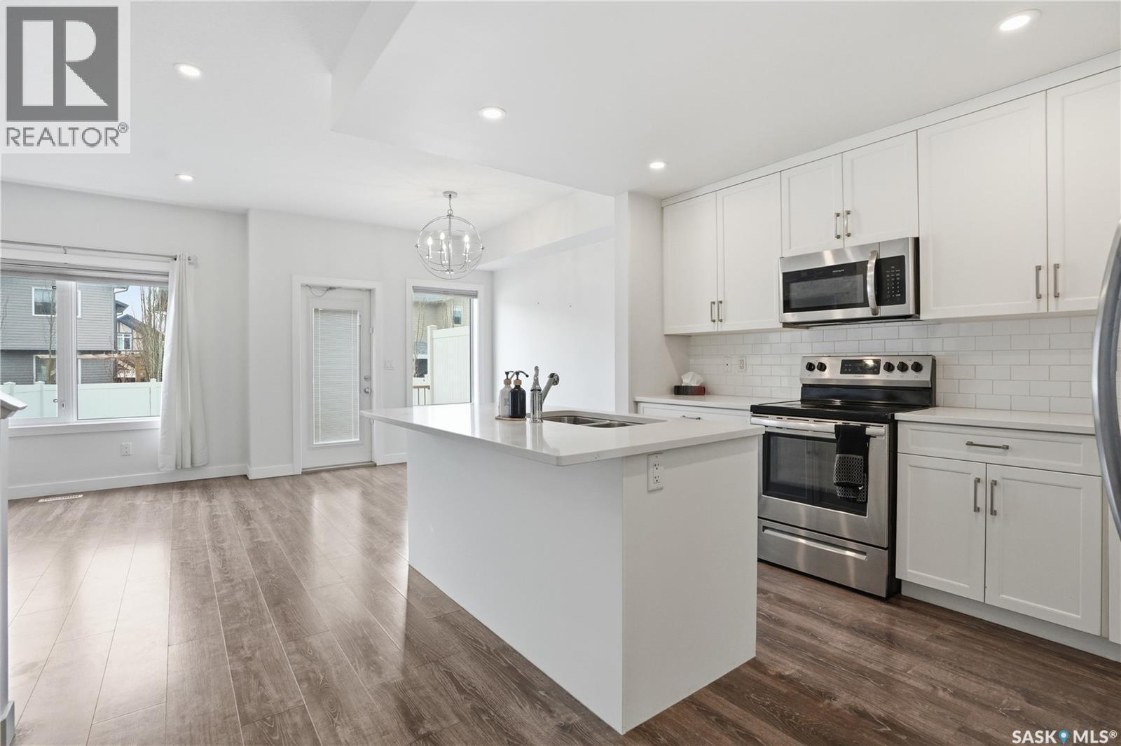 234 Brighton Gate, Saskatoon, SK - Indoor Photo Showing Kitchen With Stainless Steel Kitchen With Double Sink With Upgraded Kitchen