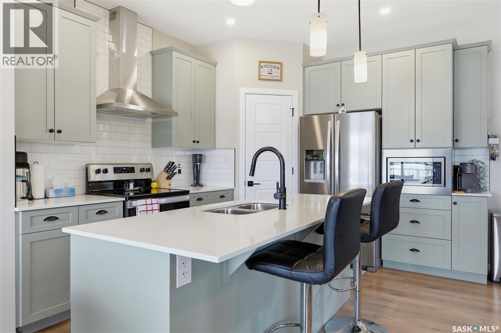 1019 Childers Court, Saskatoon, SK - Indoor Photo Showing Kitchen With Double Sink With Upgraded Kitchen