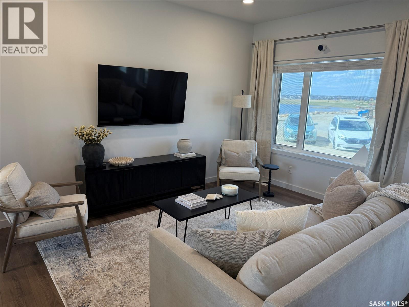 75 Taskamanwa Terrace, Saskatoon, SK - Indoor Photo Showing Living Room