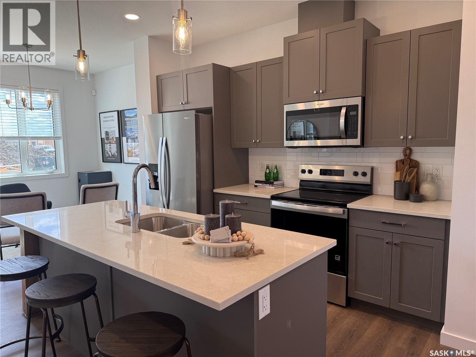 75 Taskamanwa Terrace, Saskatoon, SK - Indoor Photo Showing Kitchen With Double Sink With Upgraded Kitchen