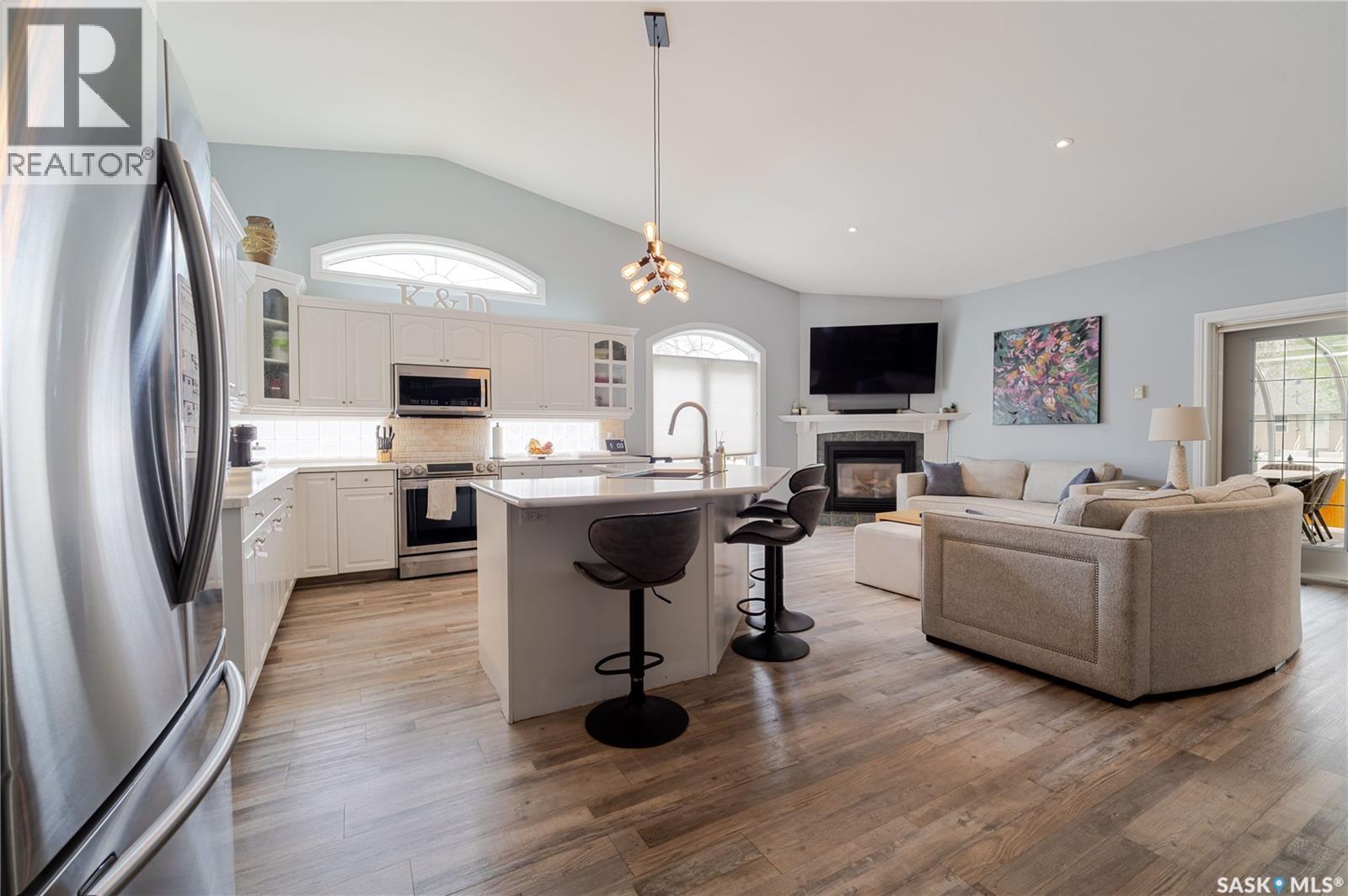 1054 Monk Avenue, Moose Jaw, SK - Indoor Photo Showing Other Room With Fireplace