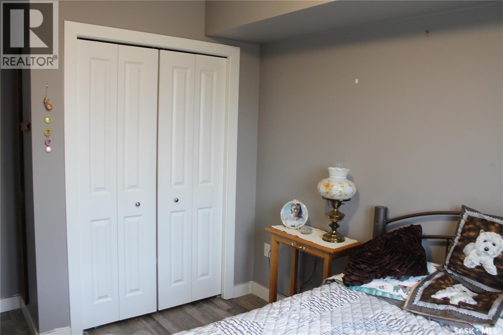 404 820 5Th Street Ne, Weyburn, SK - Indoor Photo Showing Bedroom