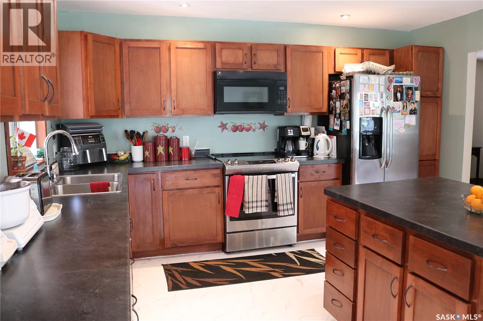 211 Pipestone Avenue, Wawota, SK - Indoor Photo Showing Kitchen With Double Sink