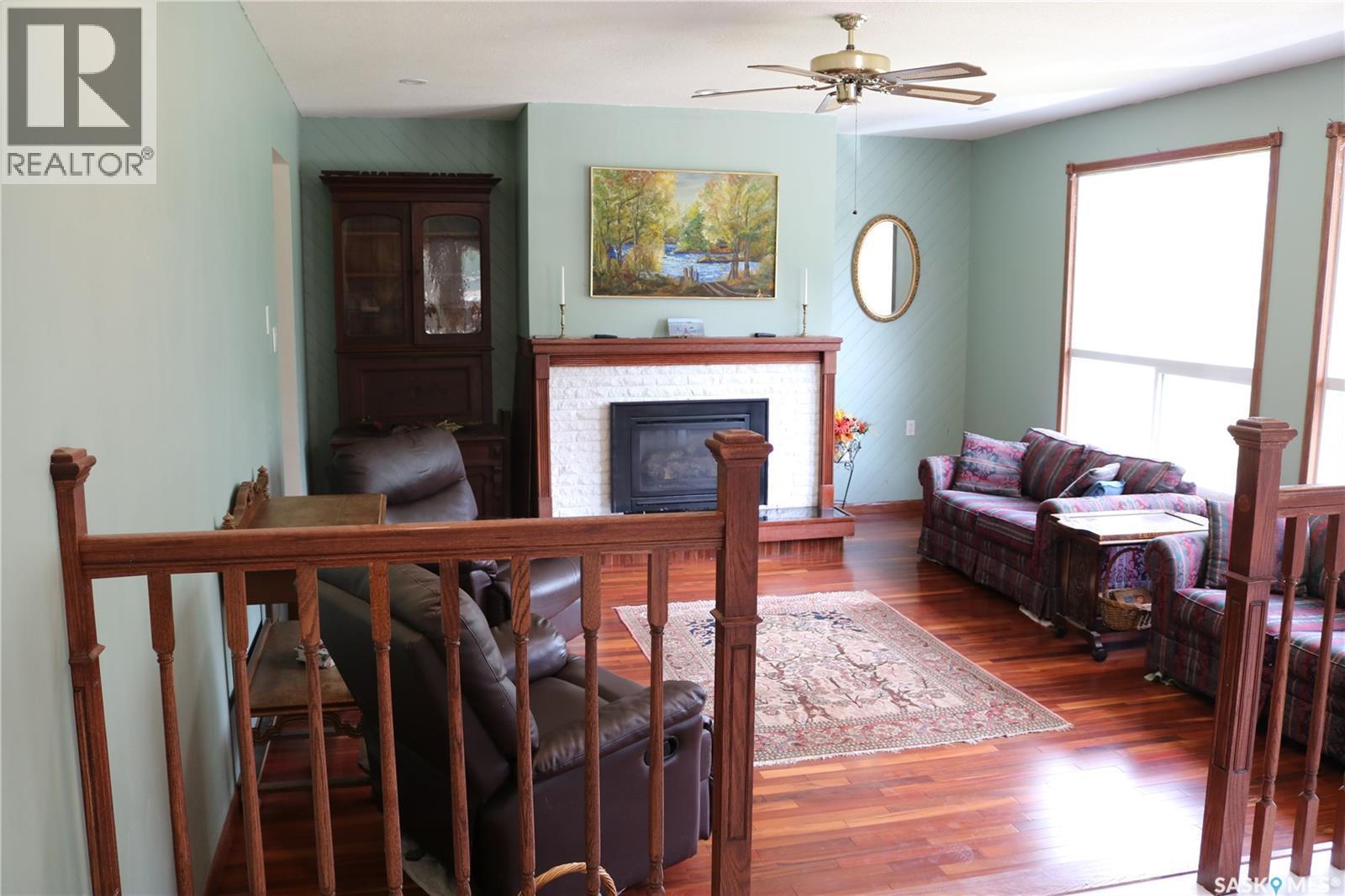 211 Pipestone Avenue, Wawota, SK - Indoor Photo Showing Other Room With Fireplace