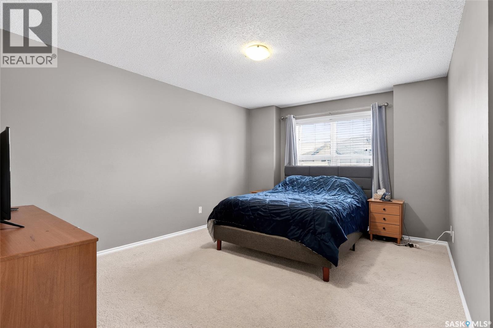 201 105 Lynd Crescent, Saskatoon, SK - Indoor Photo Showing Bedroom
