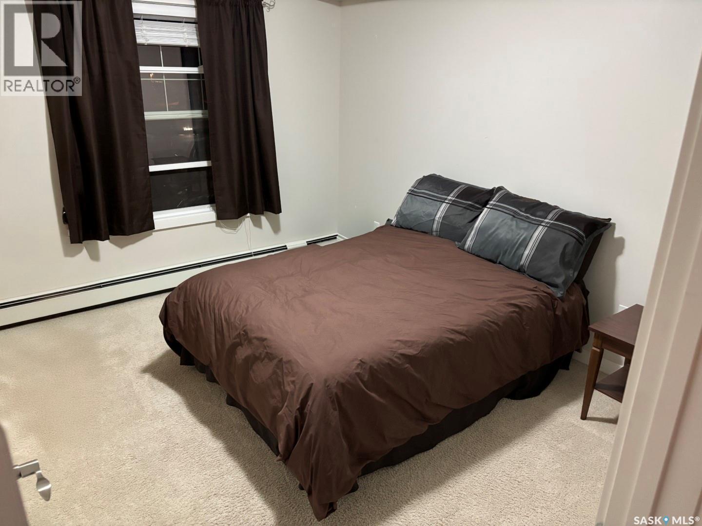 207 211 Ledingham Street, Saskatoon, SK - Indoor Photo Showing Bedroom