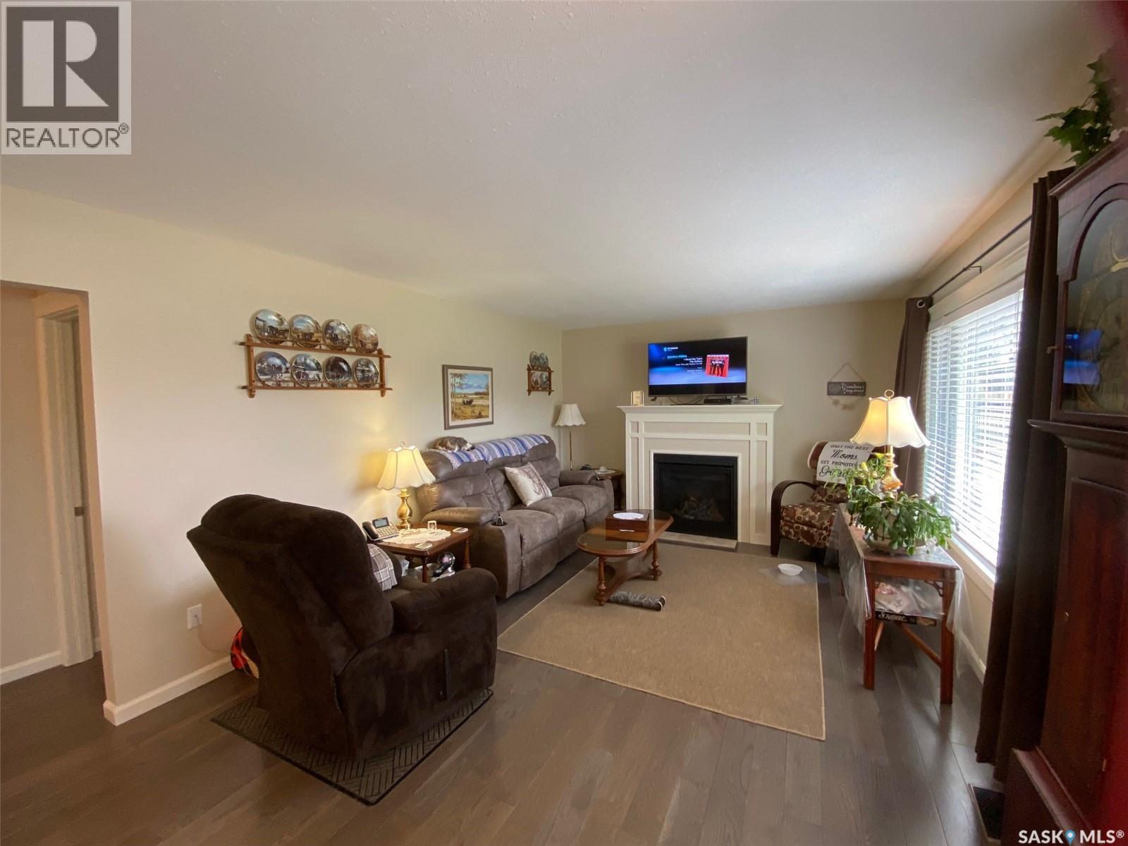 536 Stanley Street, Esterhazy, SK - Indoor Photo Showing Living Room With Fireplace