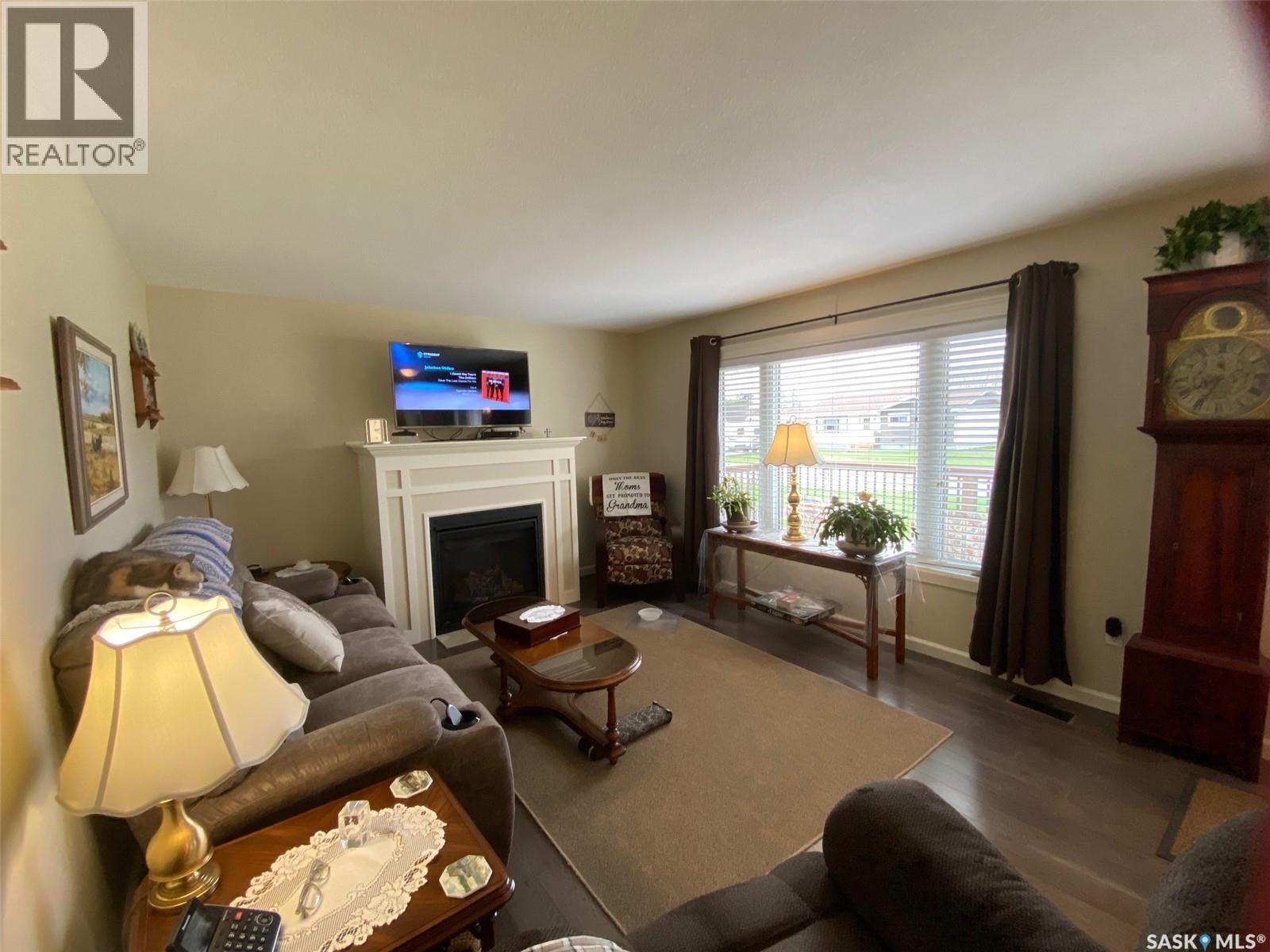 536 Stanley Street, Esterhazy, SK - Indoor Photo Showing Living Room With Fireplace