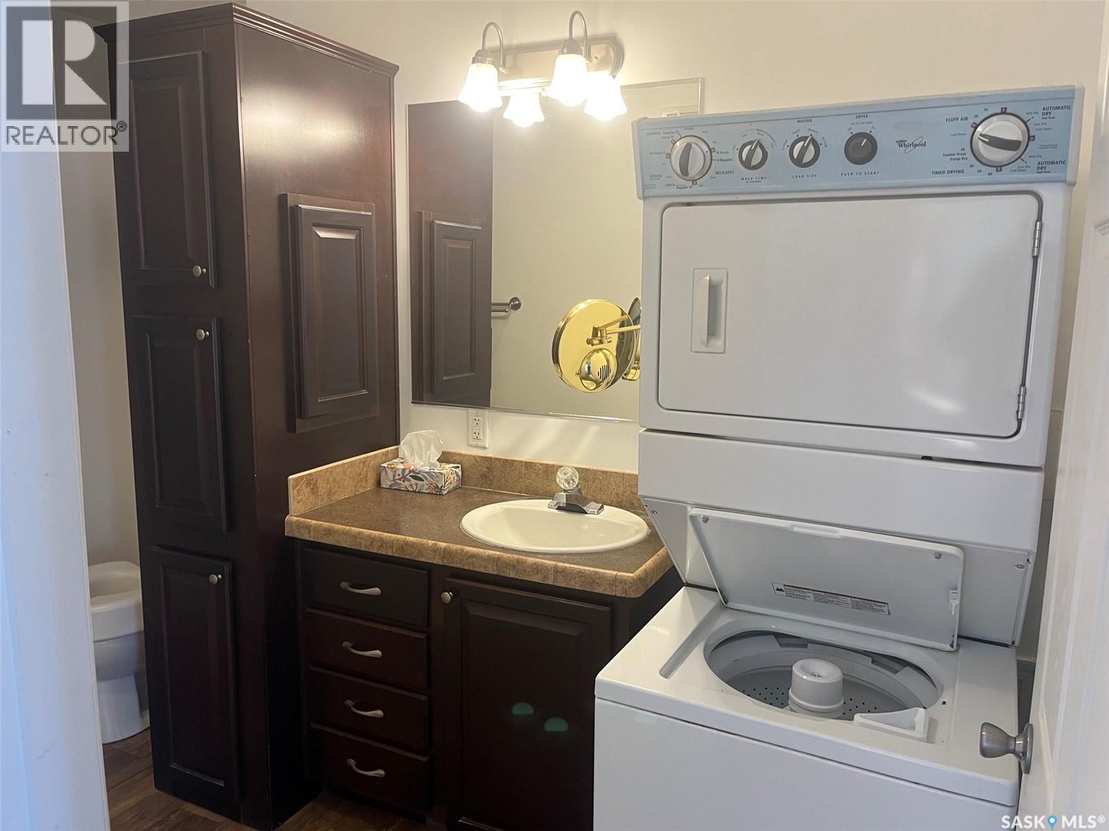 320 3Rd Avenue W, Christopher Lake, SK - Indoor Photo Showing Laundry Room