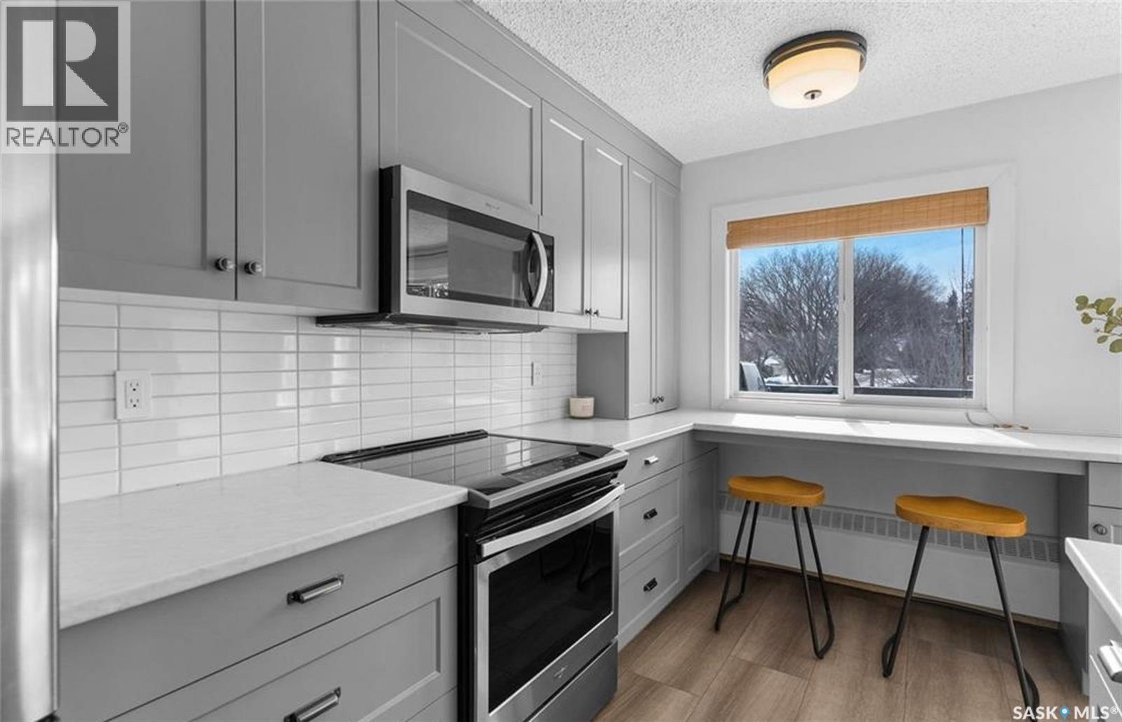 9 605 Wilson Crescent, Saskatoon, SK - Indoor Photo Showing Kitchen With Upgraded Kitchen