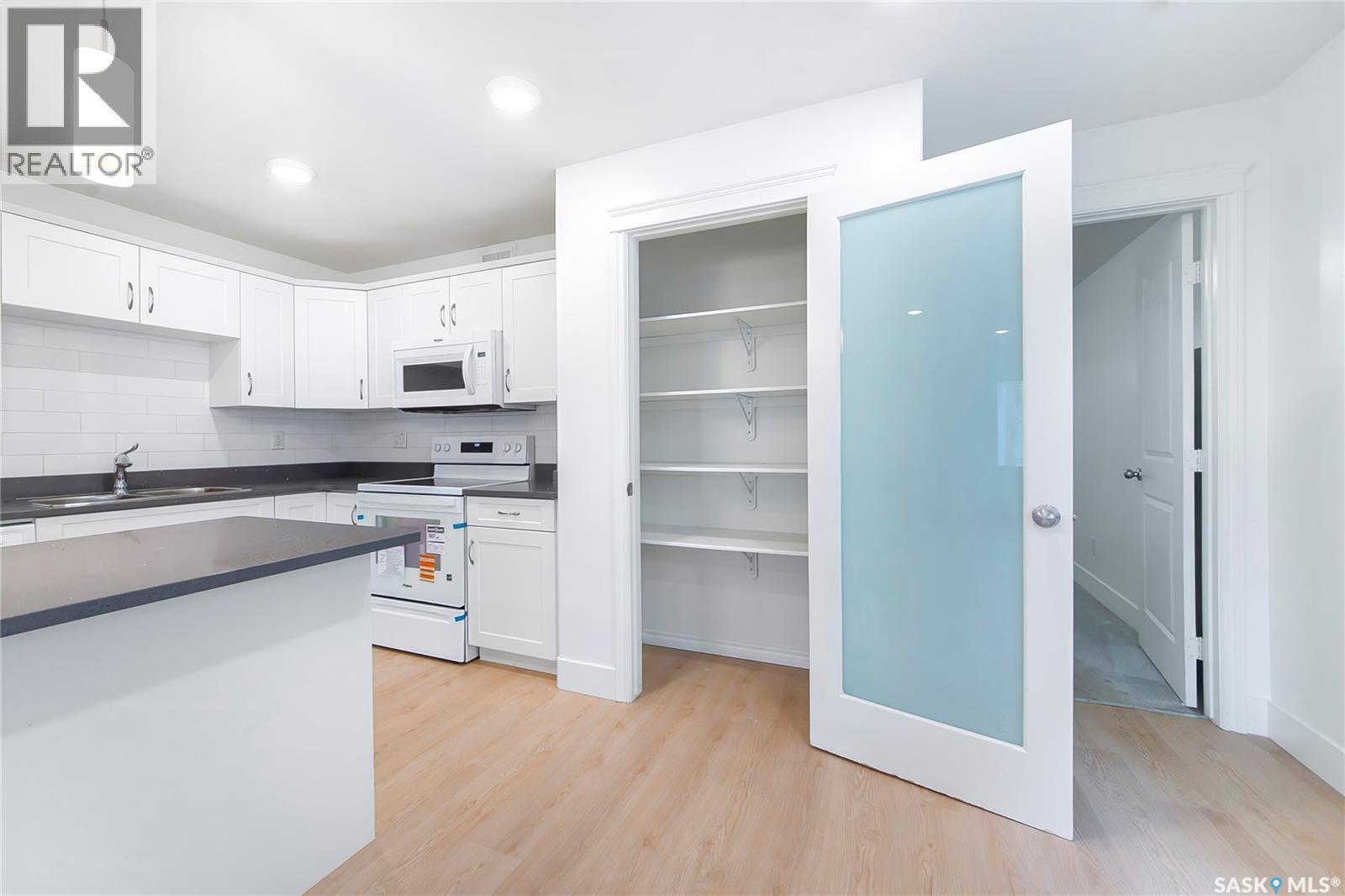 501 110 Akhtar Bend, Saskatoon, SK - Indoor Photo Showing Kitchen With Double Sink