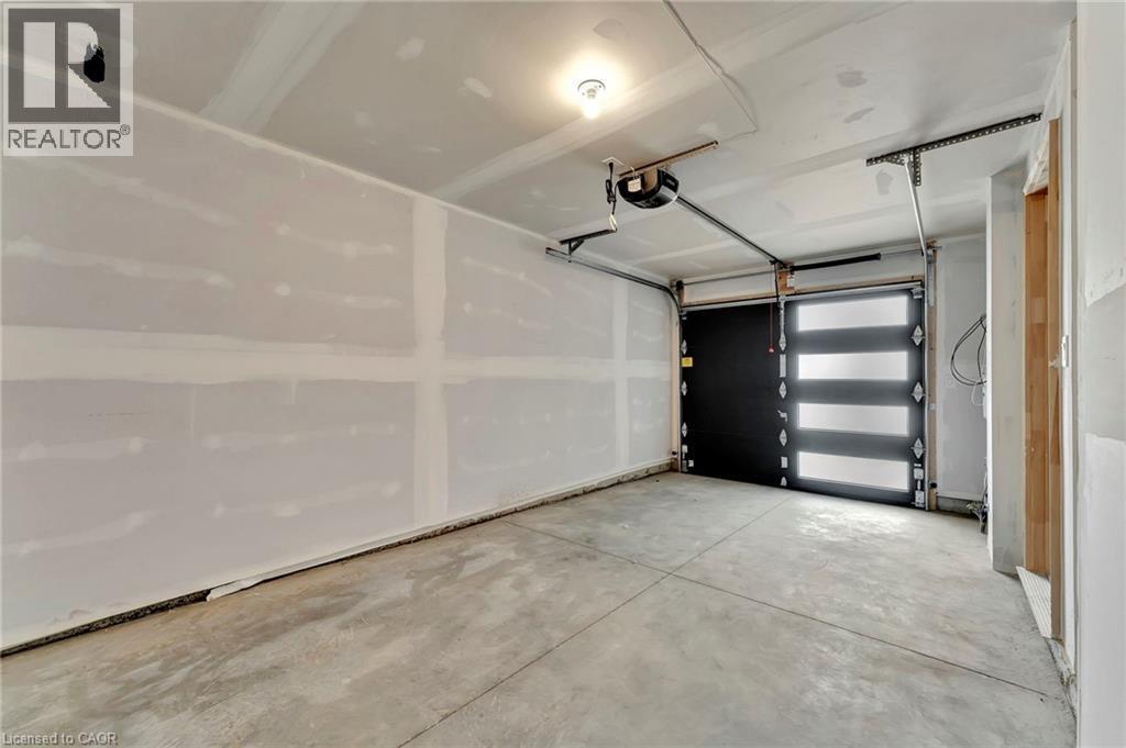 55 Tom Brown Drive Unit# 90, Paris, ON - Indoor Photo Showing Garage
