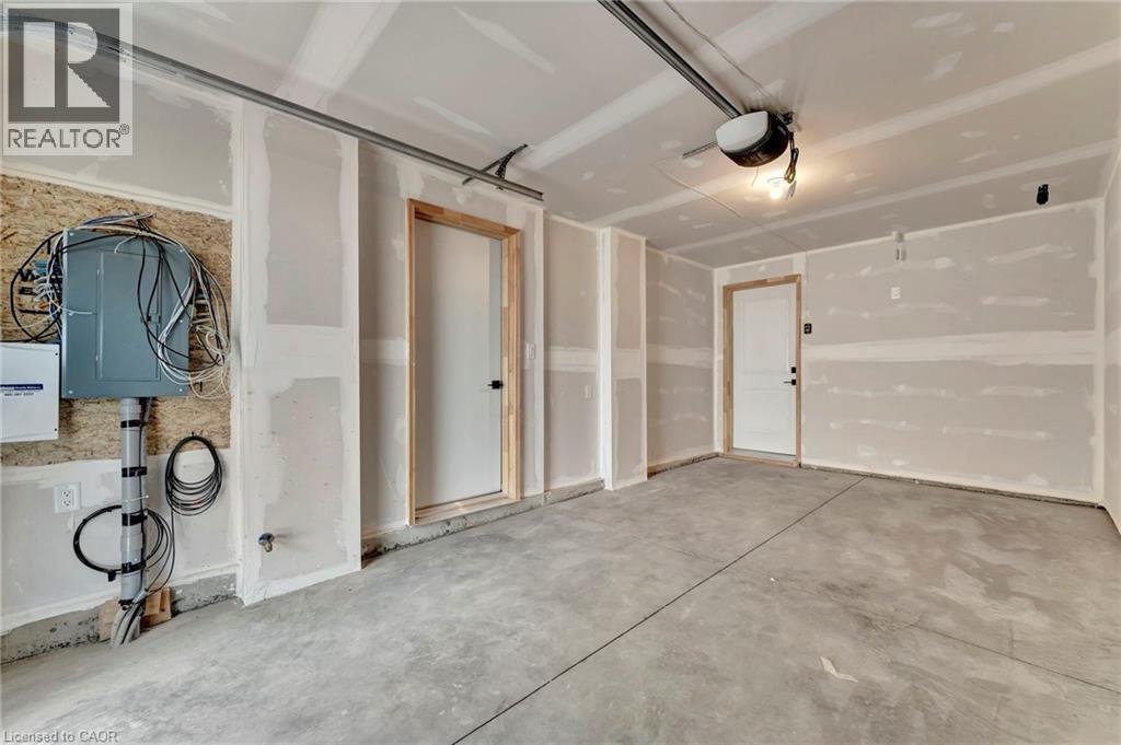 55 Tom Brown Drive Unit# 90, Paris, ON - Indoor Photo Showing Garage