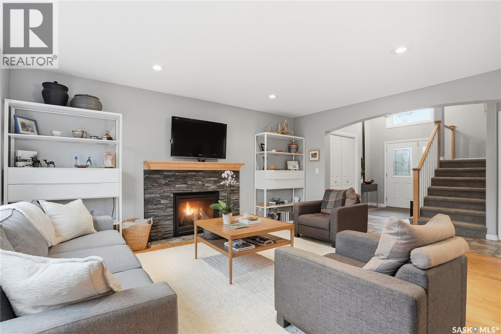 215 Whalley Crescent, Saskatoon, SK - Indoor Photo Showing Living Room With Fireplace
