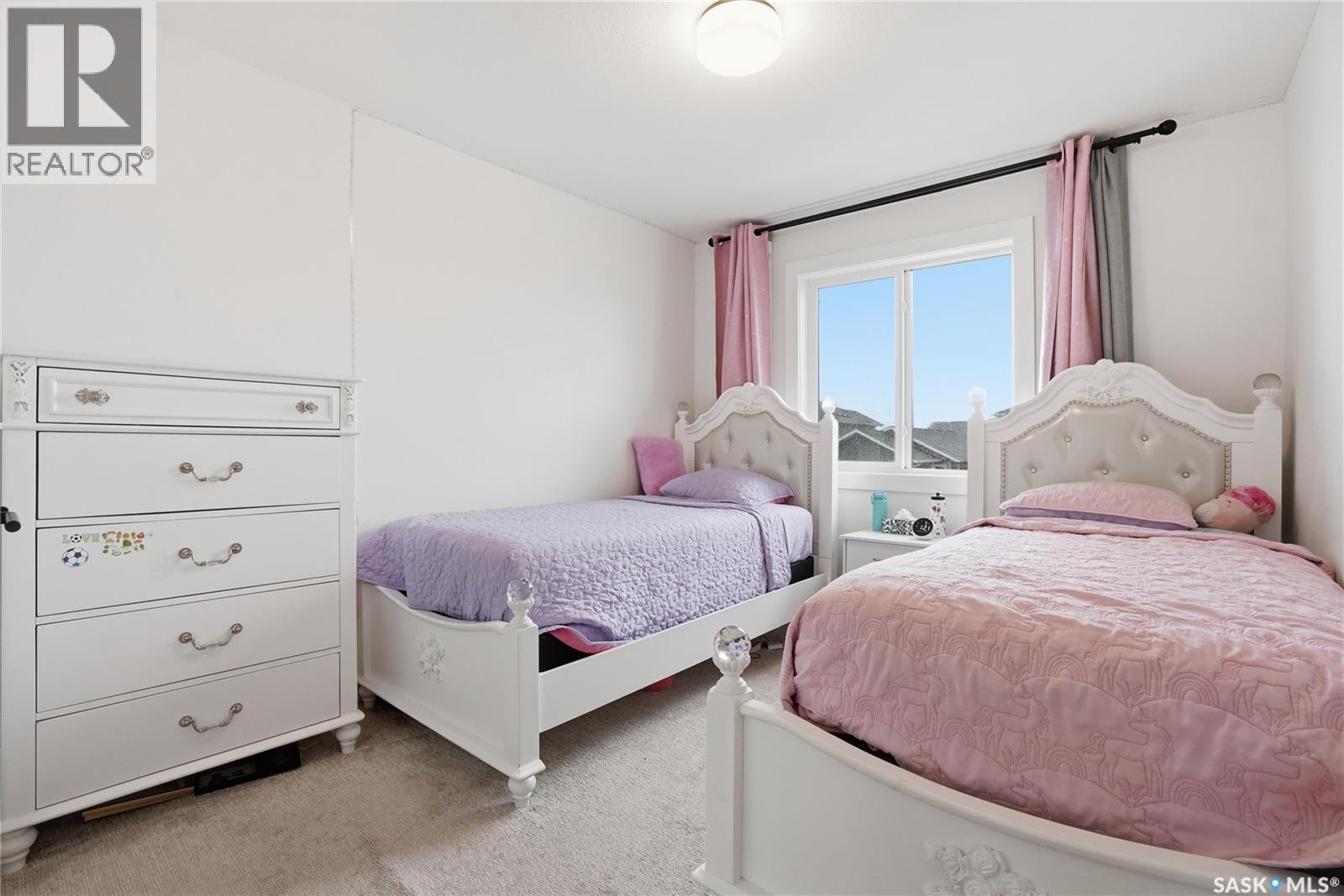 187 Rosewood Boulevard E, Saskatoon, SK - Indoor Photo Showing Bedroom