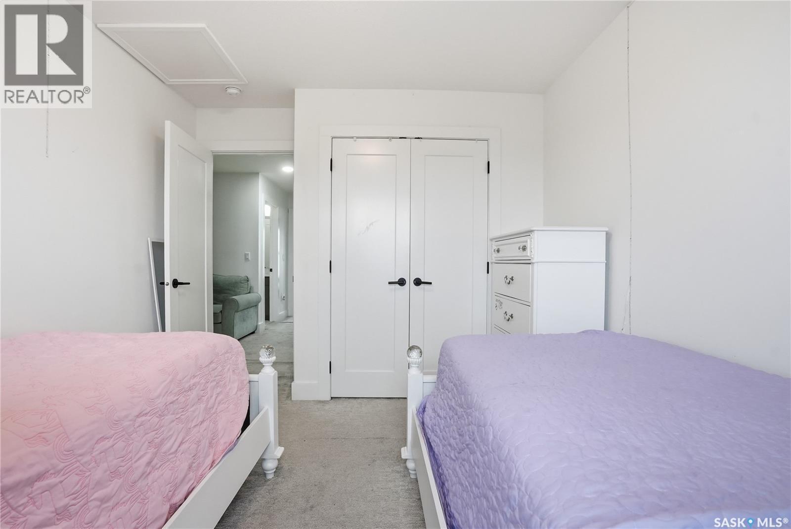 187 Rosewood Boulevard E, Saskatoon, SK - Indoor Photo Showing Bedroom