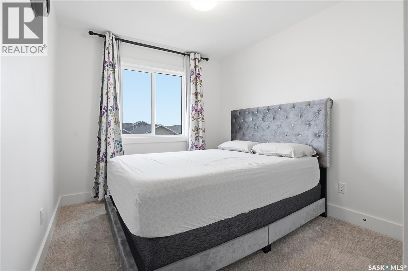 187 Rosewood Boulevard E, Saskatoon, SK - Indoor Photo Showing Bedroom