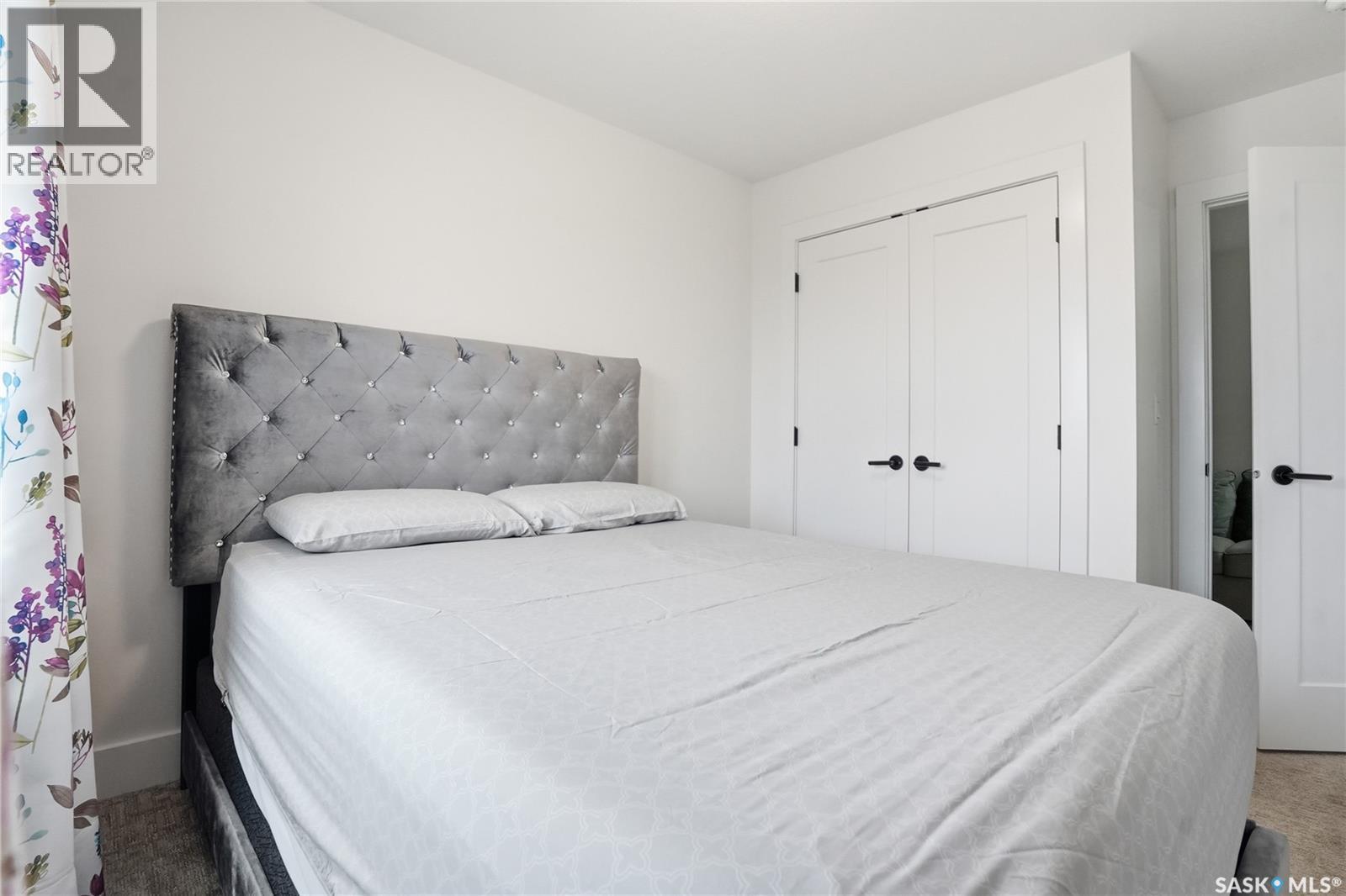 187 Rosewood Boulevard E, Saskatoon, SK - Indoor Photo Showing Bedroom