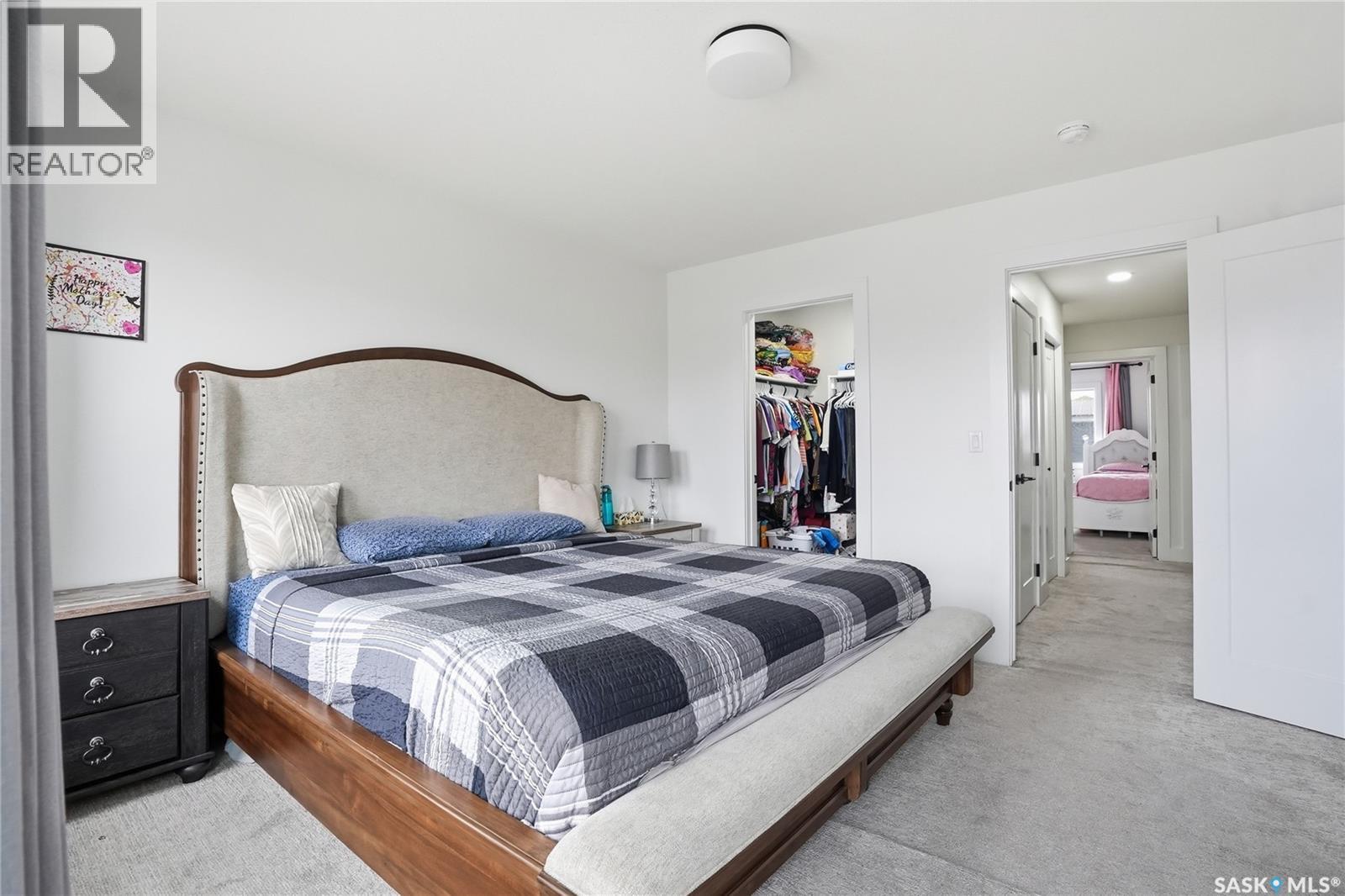 187 Rosewood Boulevard E, Saskatoon, SK - Indoor Photo Showing Bedroom