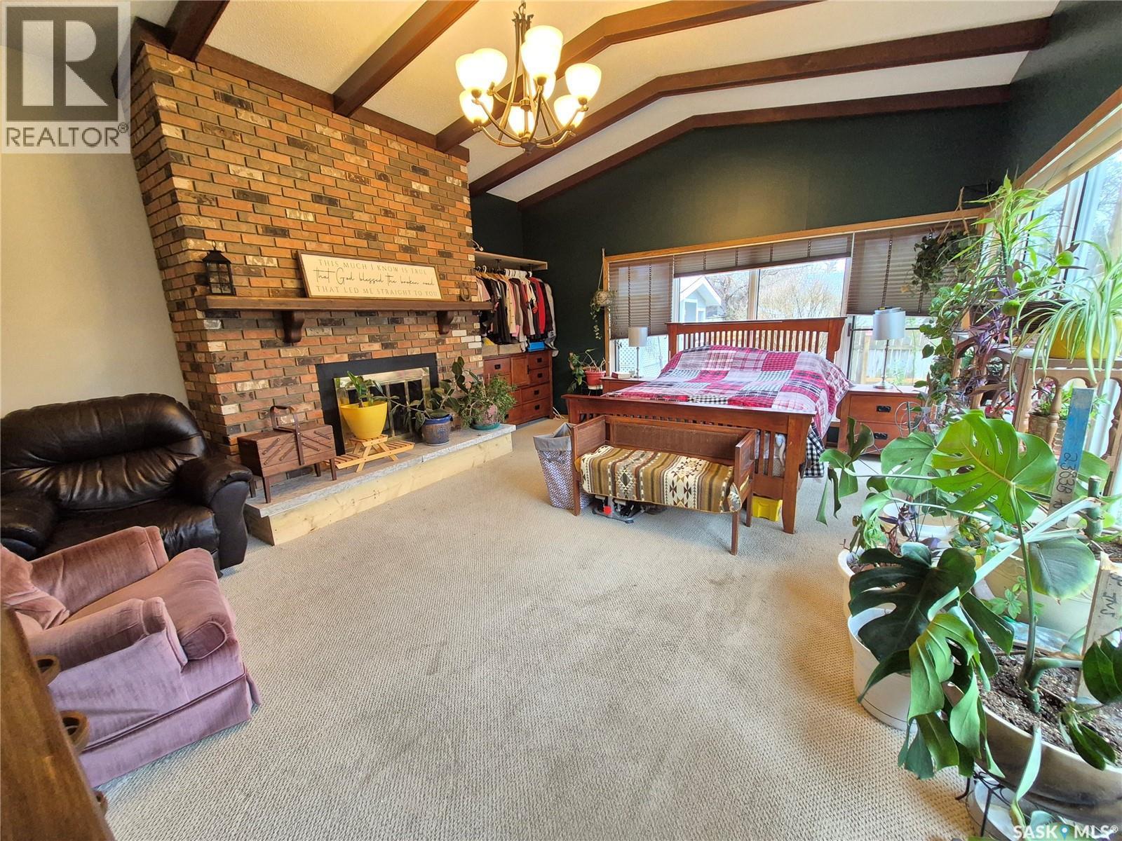 451 Woodlawn Crescent, Weyburn, SK - Indoor With Fireplace