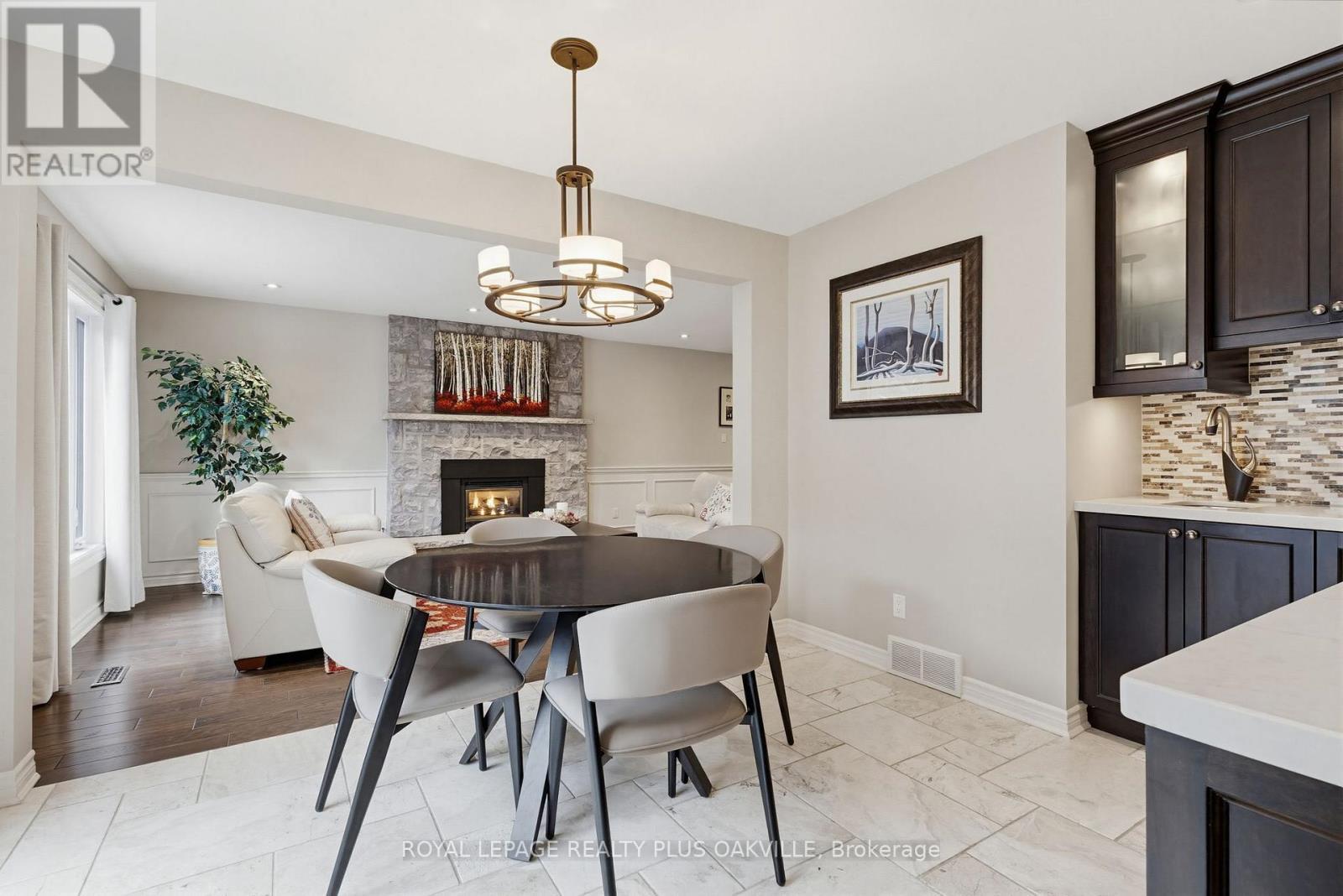 Eat in kitchen - 67 Honeysuckle Crescent, Hamilton, ON - Indoor Photo Showing Dining Room With Fireplace