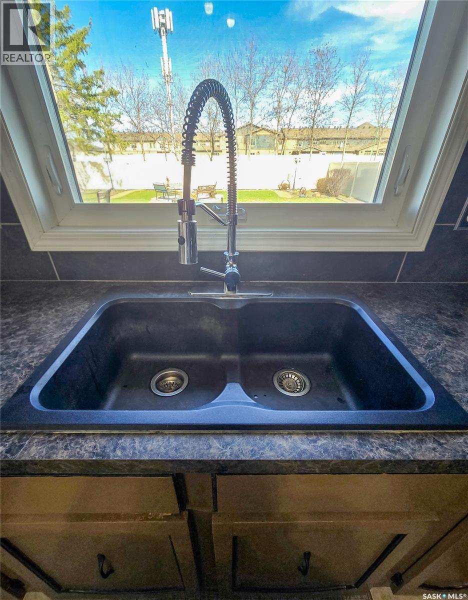 15 Mackenzie Drive, Yorkton, SK - Indoor Photo Showing Kitchen With Double Sink