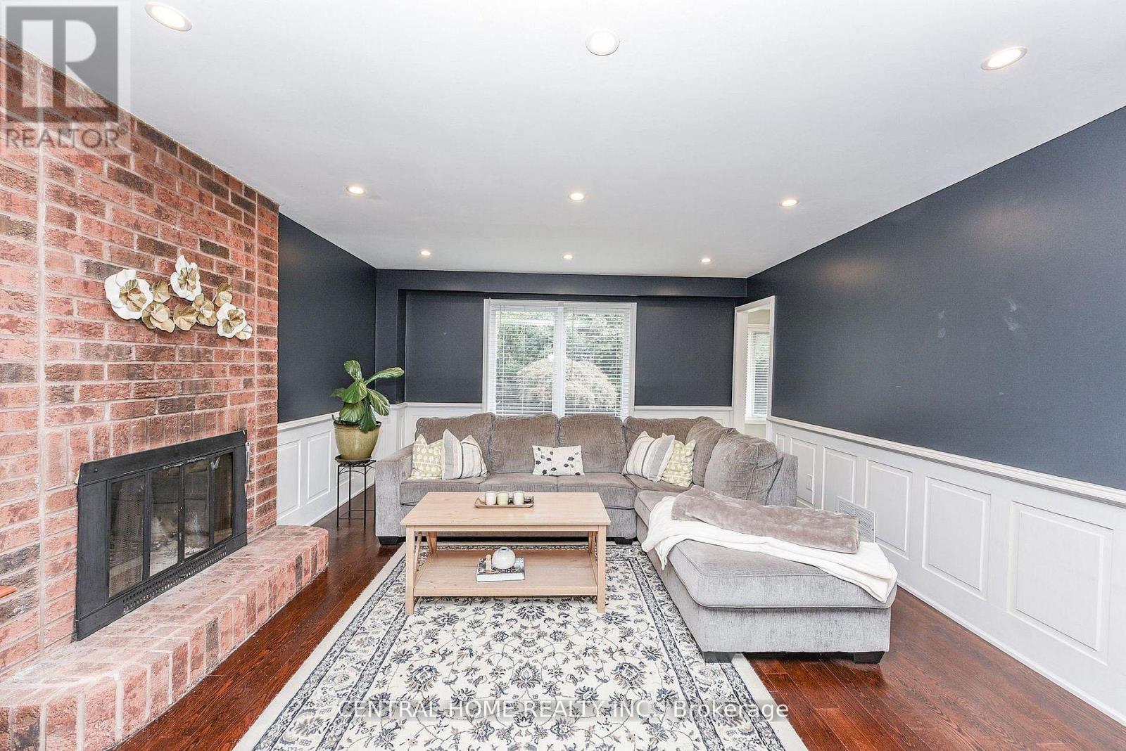 4 Robaldon Road, Toronto, ON - Indoor Photo Showing Living Room With Fireplace