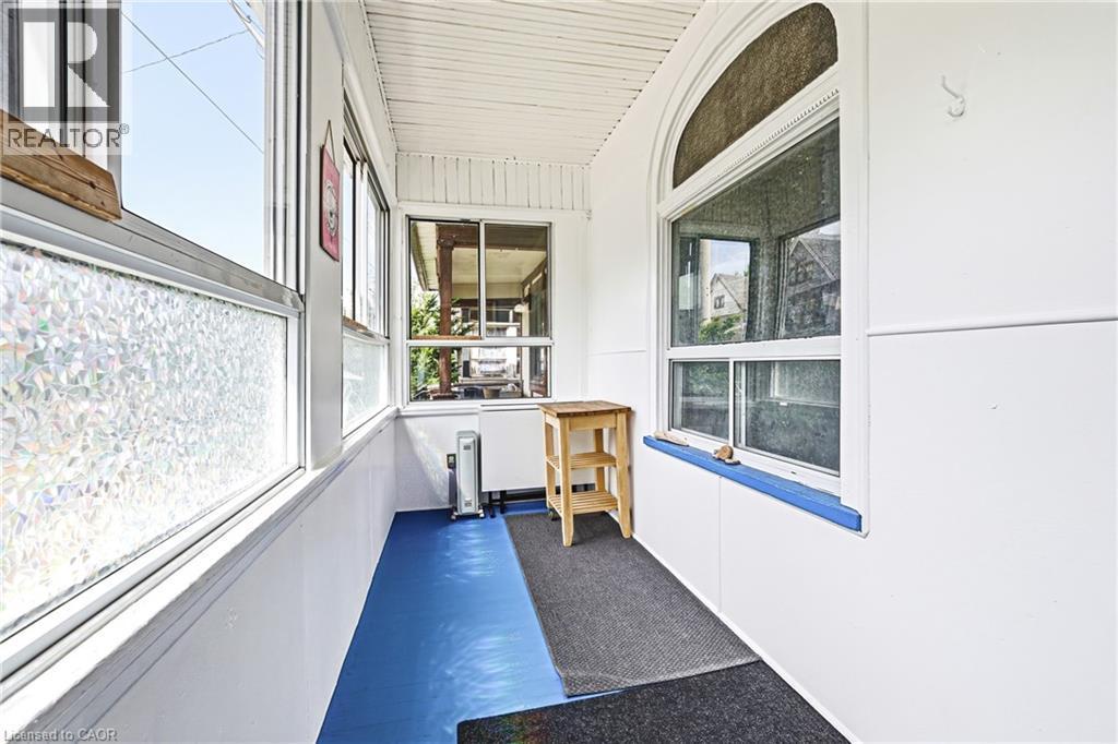 Enclosed Porch with plenty of room to sit - 43 Harvey Street, Hamilton, ON - Indoor Photo Showing Other Room