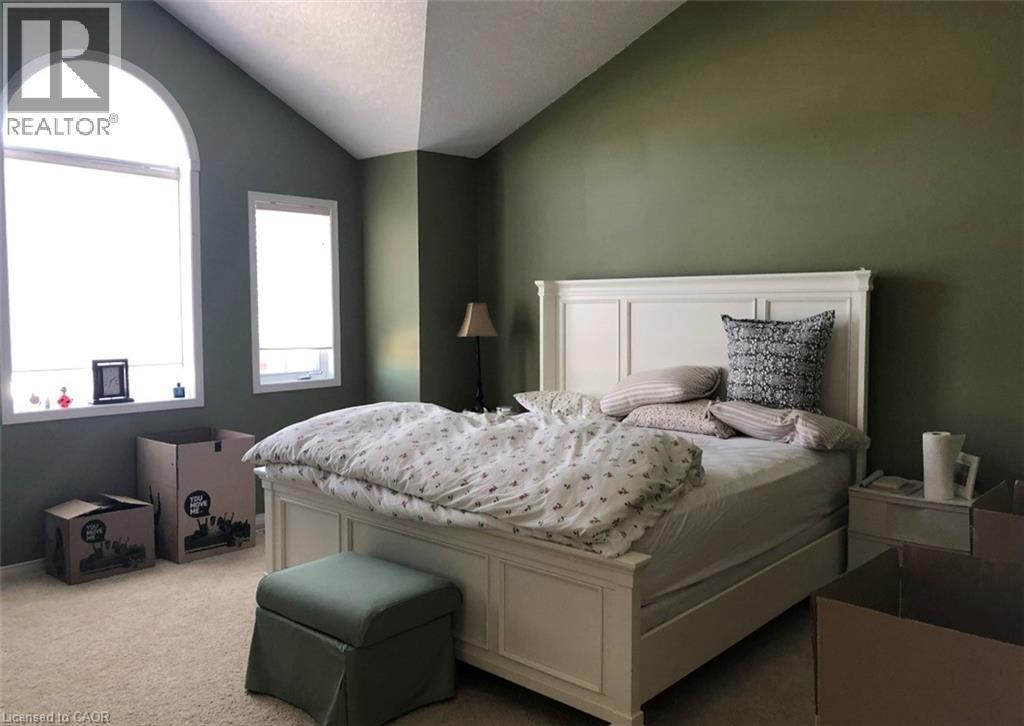 Bedroom featuring a vaulted ceiling and an arched window - 350 Havendale Crescent, Waterloo, ON - Indoor Photo Showing Bedroom