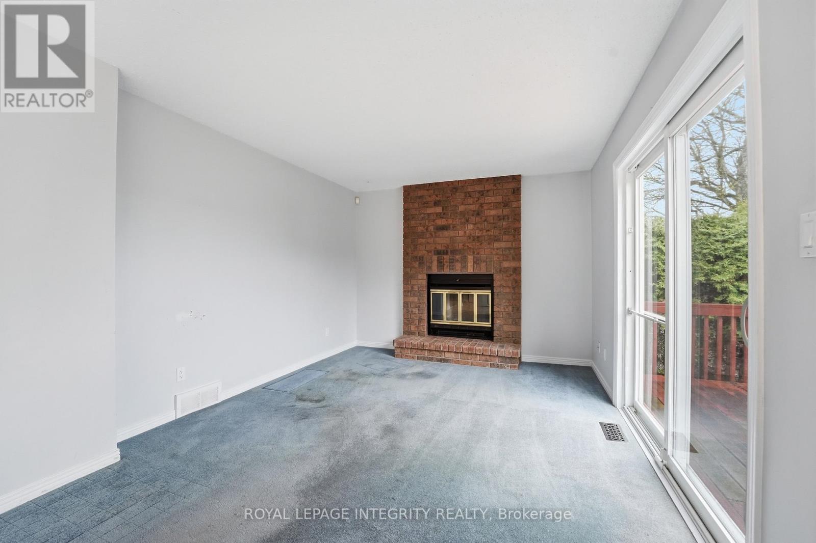 Family Room - 2133 Lenester Avenue, Ottawa, ON - Indoor Photo Showing Other Room With Fireplace
