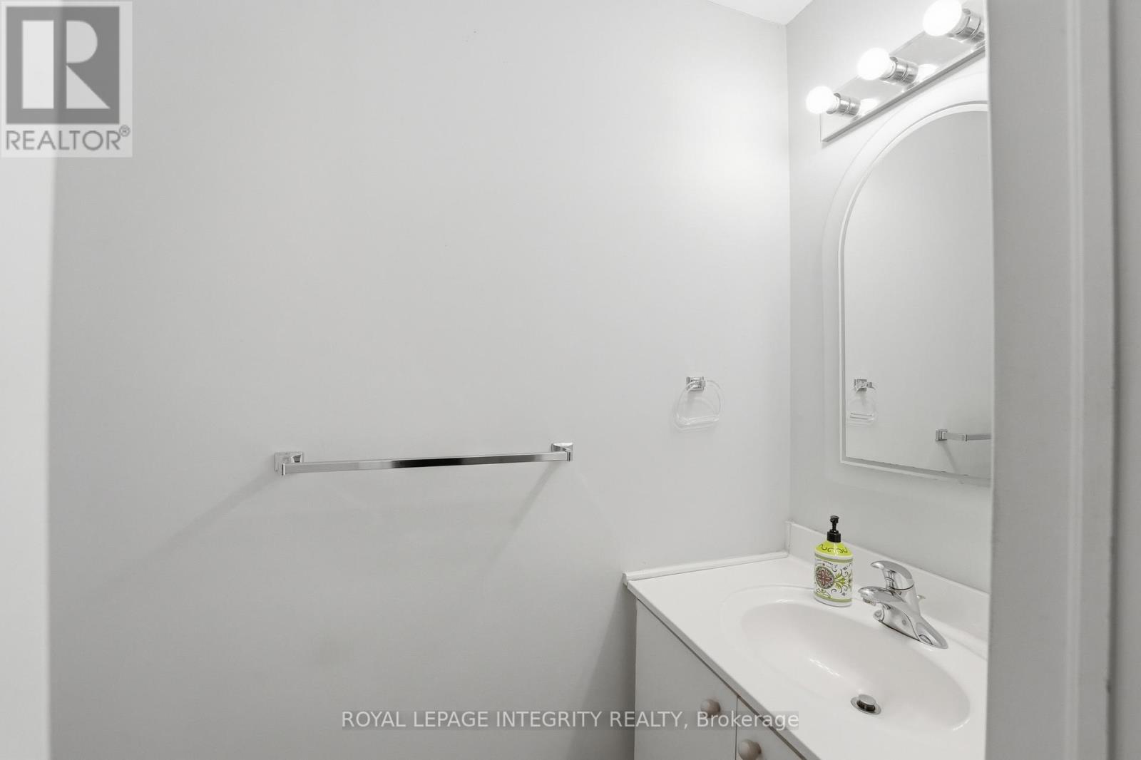 Main Floor 2pc Powder Room - 2133 Lenester Avenue, Ottawa, ON - Indoor Photo Showing Bathroom