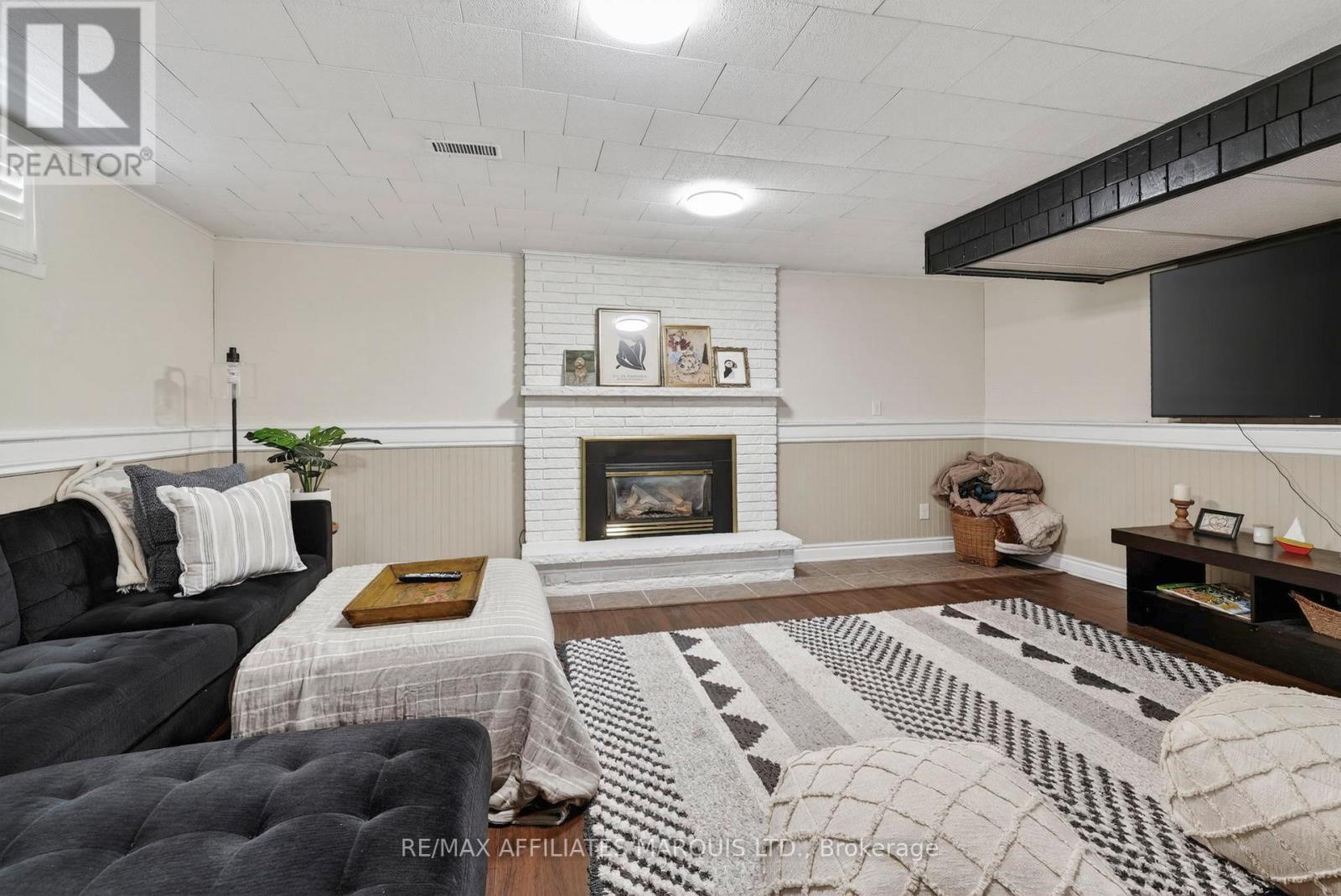 948 Fourth Street E, Cornwall, ON - Indoor Photo Showing Living Room With Fireplace