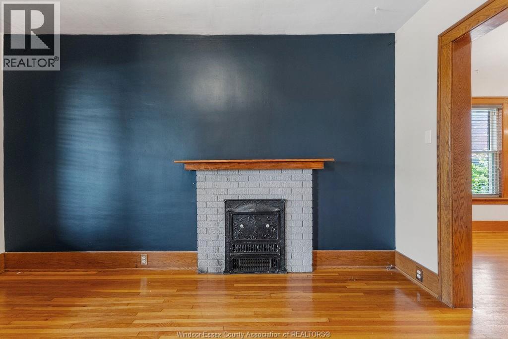 557 Moy Ave, Windsor, ON - Indoor With Fireplace