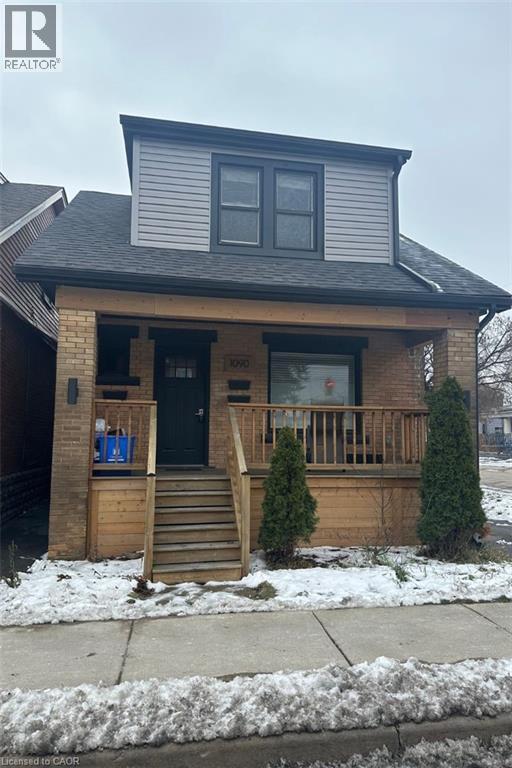 View of front of property featuring covered porch - 1090 Cannon Street E, Hamilton, ON - Outdoor With Deck Patio Veranda