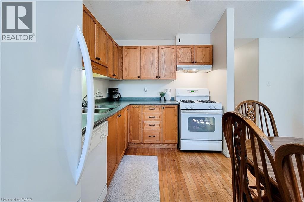 751 Rymal Road W Unit# 22, Hamilton, ON - Indoor Photo Showing Kitchen With Double Sink