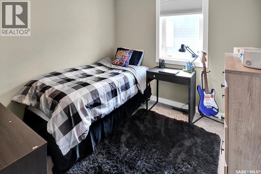 524 Maple Crescent, Warman, SK - Indoor Photo Showing Bedroom